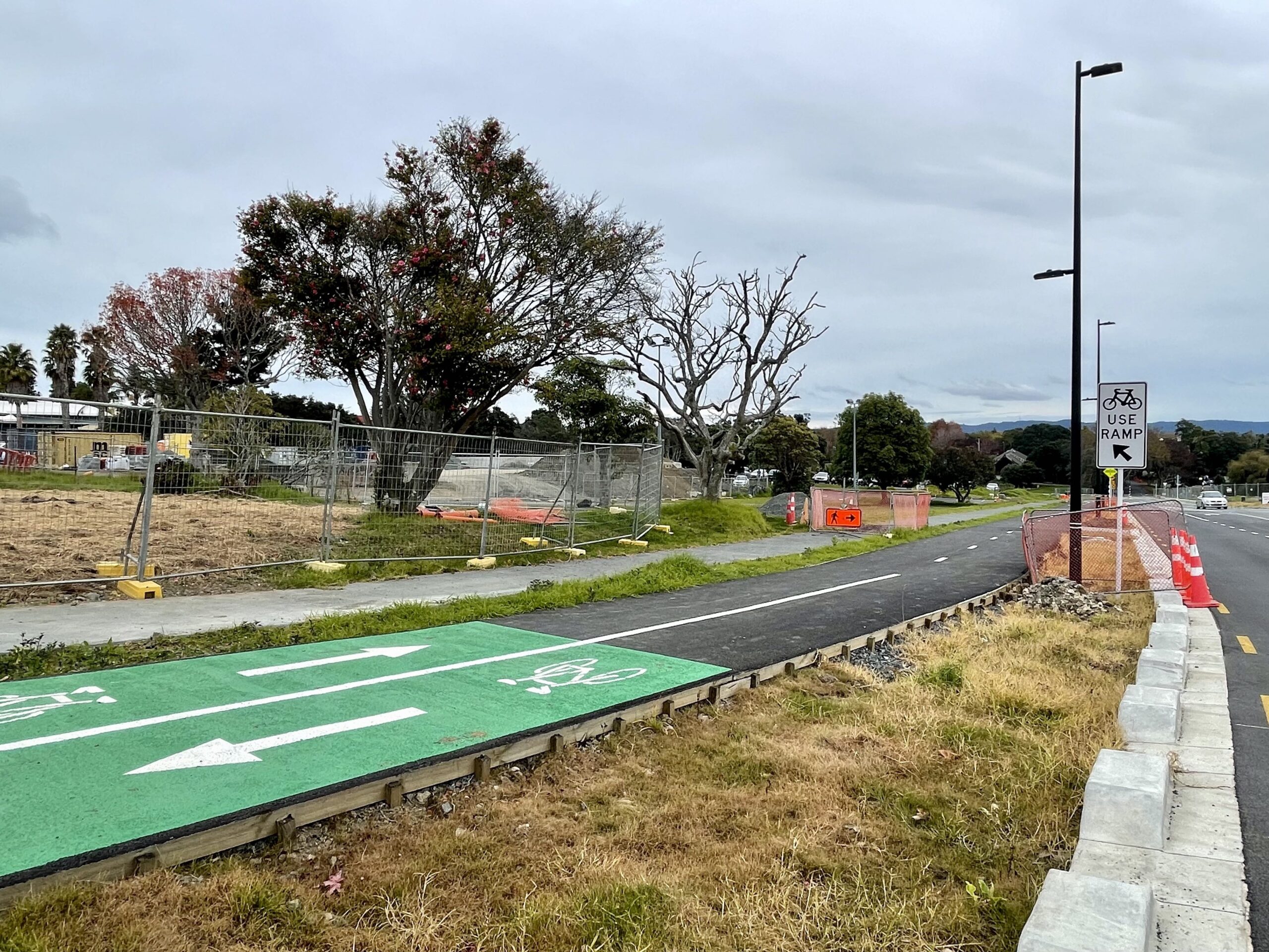 two-way cycleway on Farm road. Construction visible in the background.