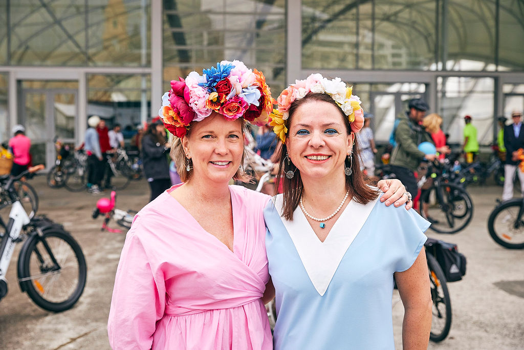 Jessica and Ayla wear pastel dresses and flowers in their hair