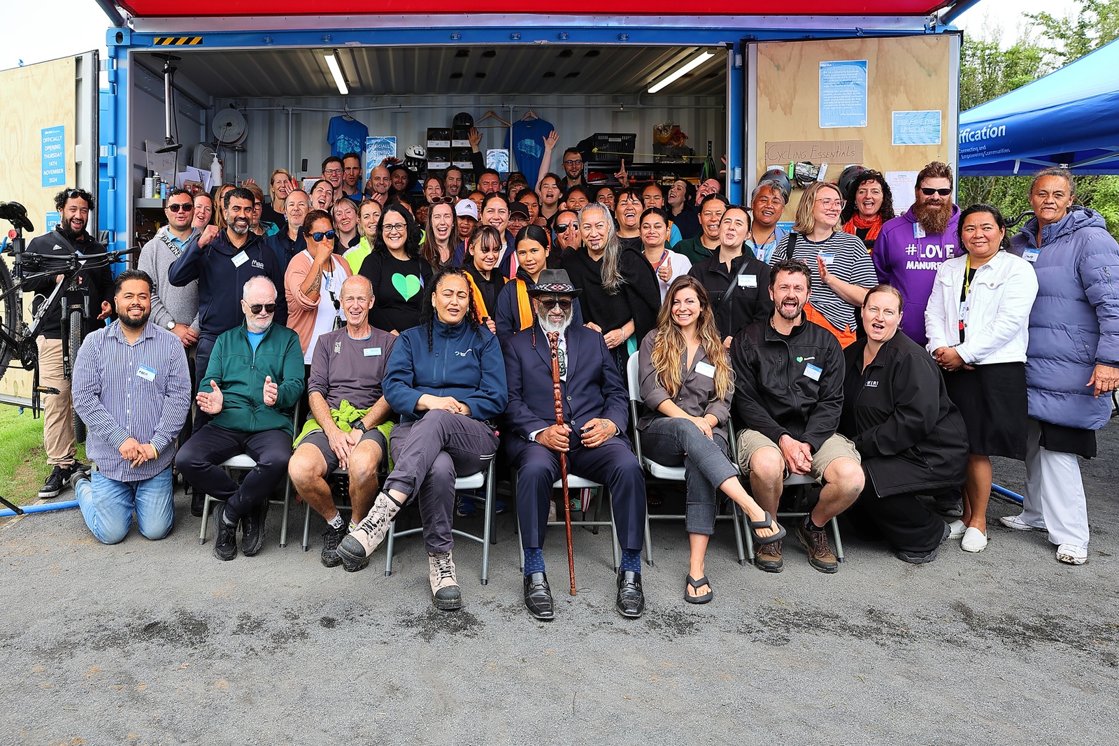 Large group of people pose for the Bike Hub opening