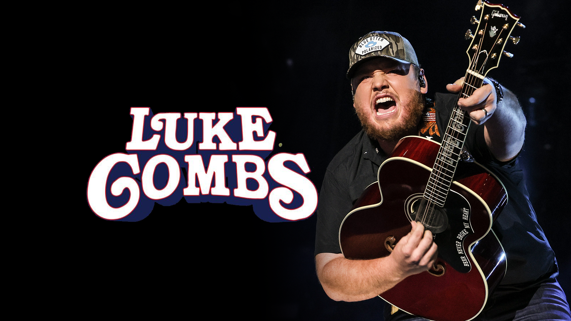 Luke Combs playing guitar