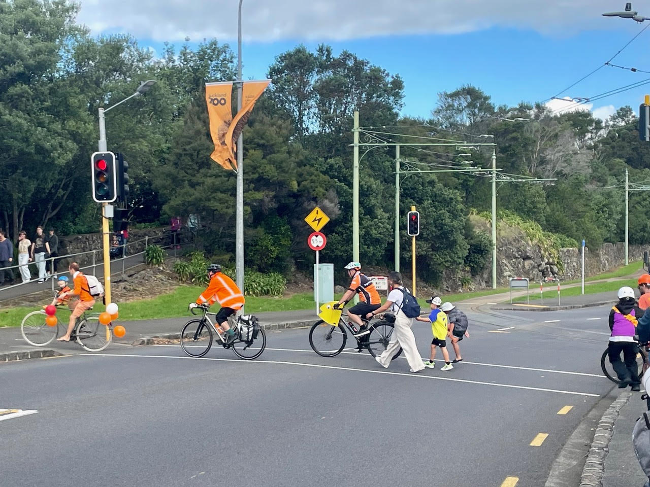 signalised crossing with people on bikes and on foot crossing