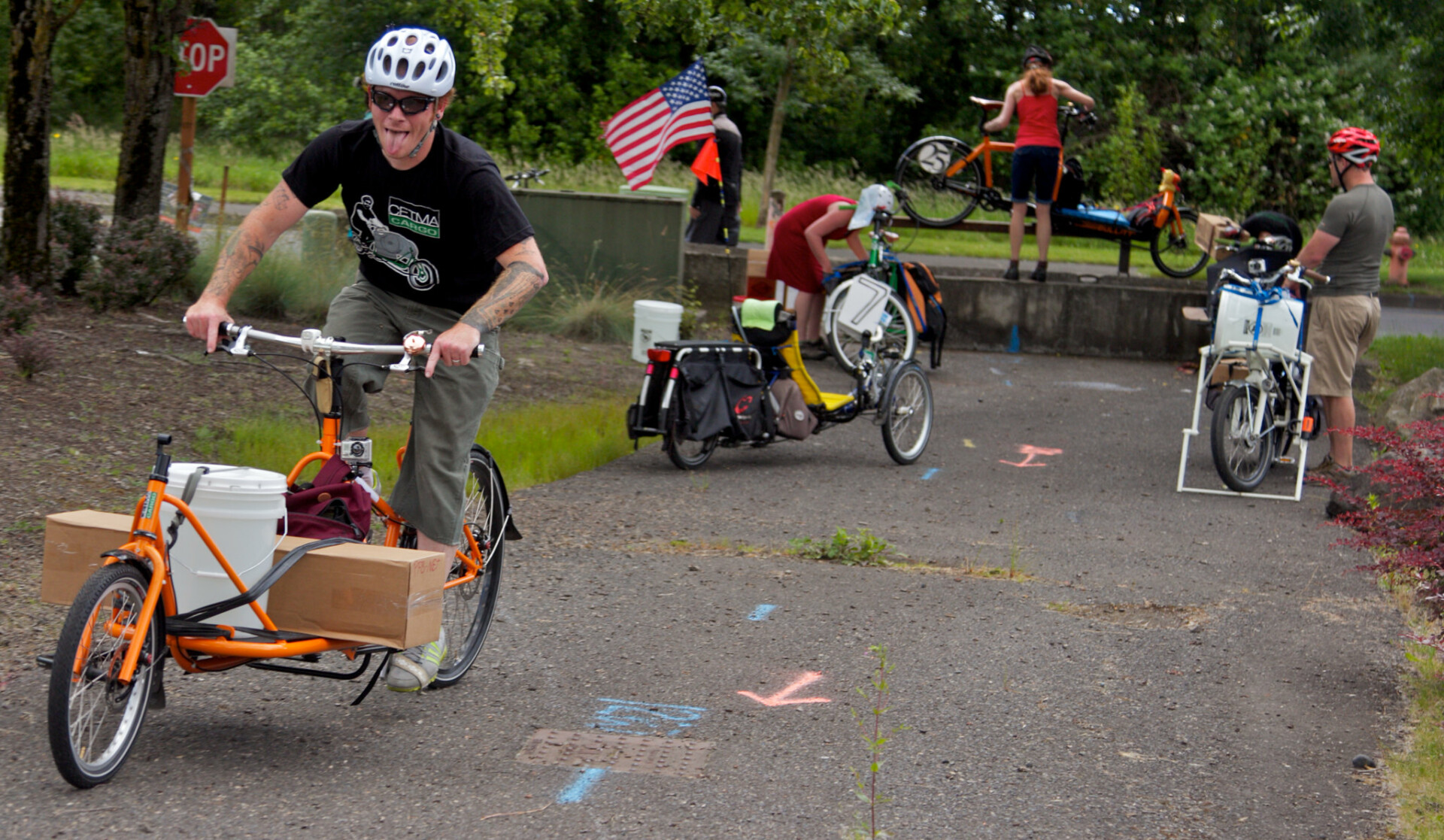 people ride loaded cargo bikes in a disaster relief trial